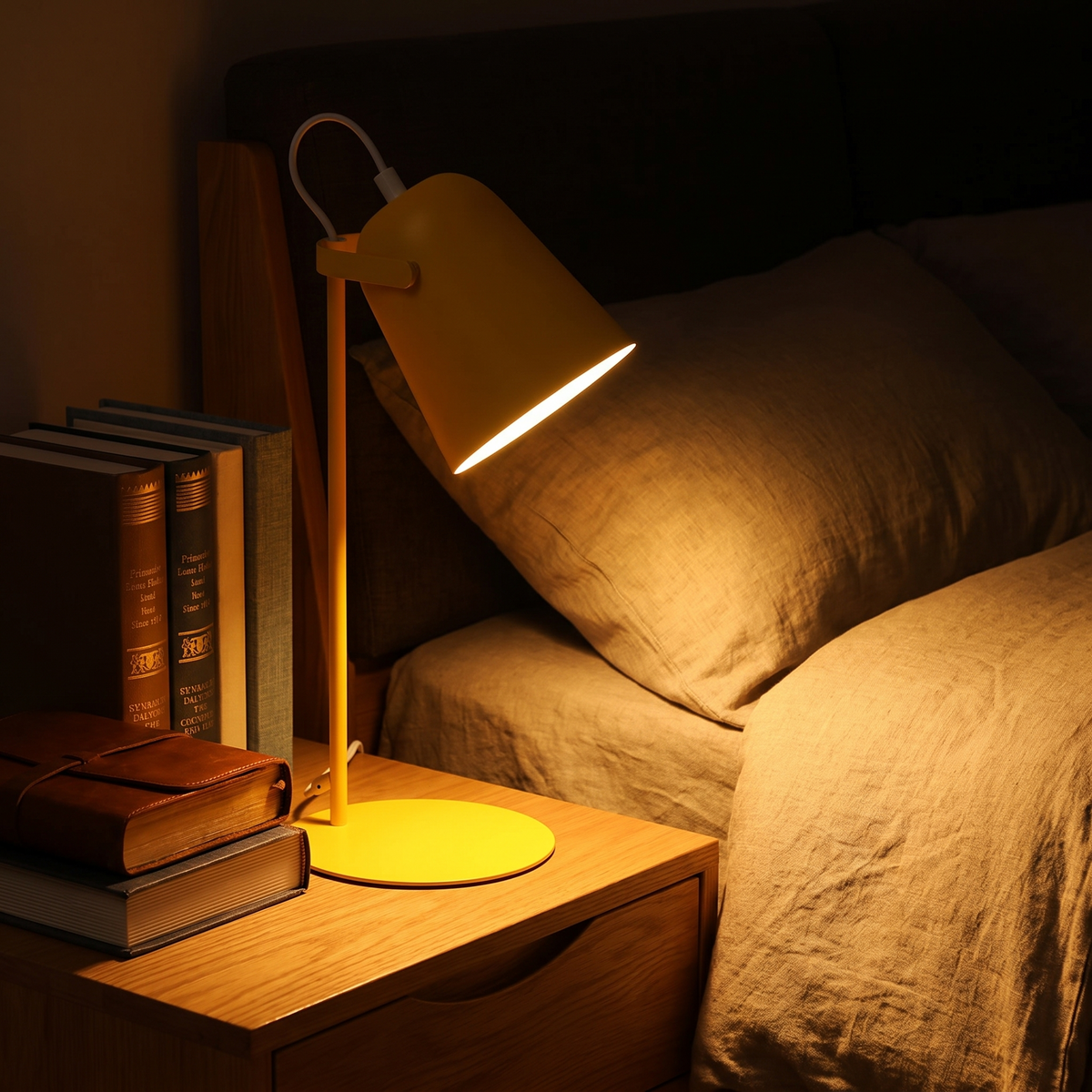 Lumen Arc desk lamp on a bedside nightstand