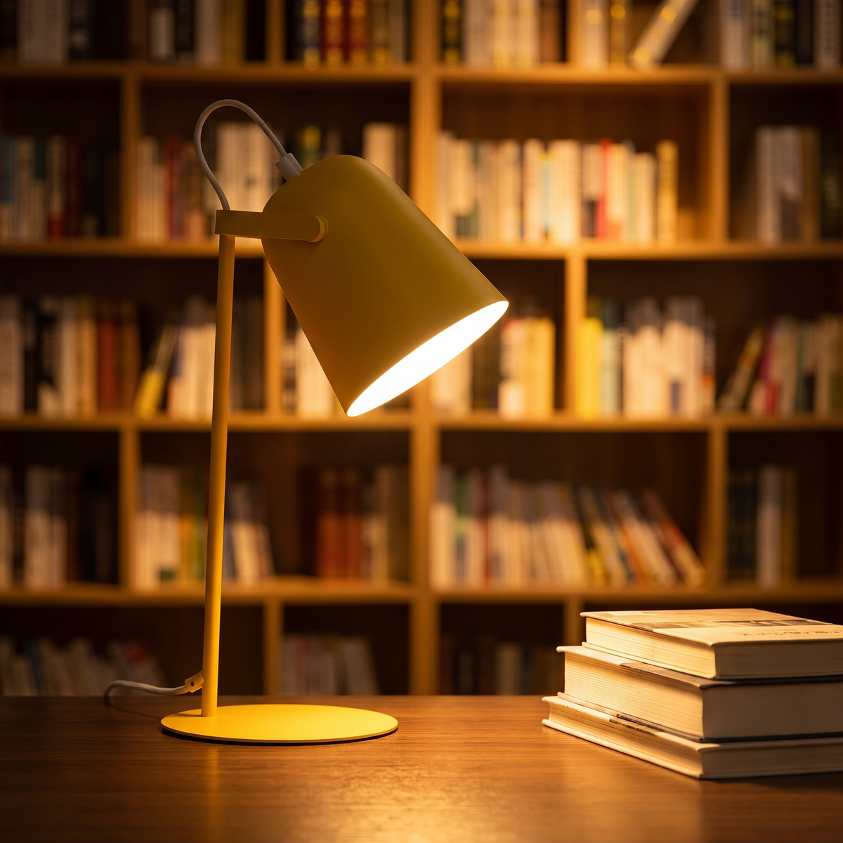 Lumen Arc desk lamp on a study desk