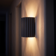 Ridgeline sconce on a hallway wall at night