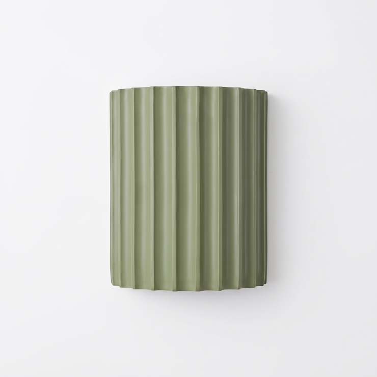 Ridgeline resin wall sconce on white