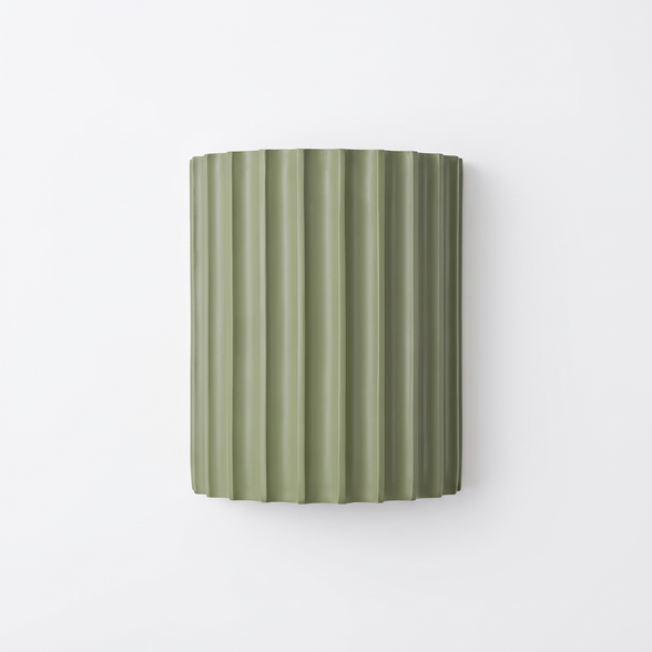 Ridgeline resin wall sconce on white