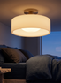 Verano opal glass flush mount ceiling light in a bedroom