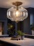 Solenne scalloped milk glass semi flush mount ceiling light in a kitchen