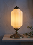 Solenne ribbed glass table lamp on an entry console