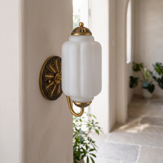 Lisette frosted milk glass wall sconce in daylight